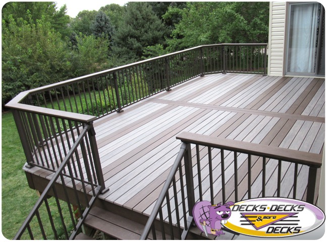 A low maintenance deck with a sliding glass door